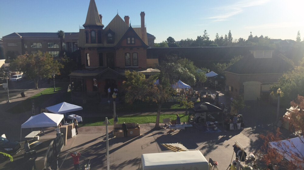 A festival at historic The Square PHX, with Rosson House in the background.