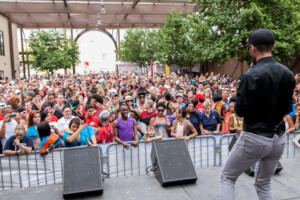 A packed crowd waits for a concert to start during a festival at the The Square PHX Lath Pavilion.