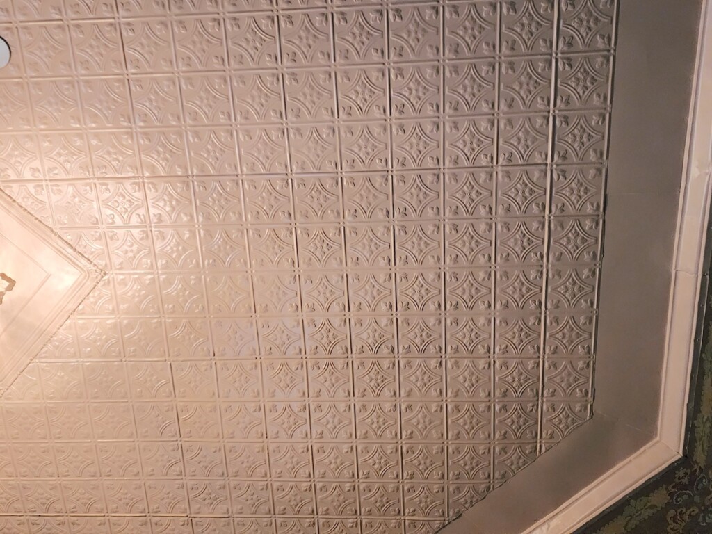 The decorative metal ceiling the the doctor's office at Rosson House.