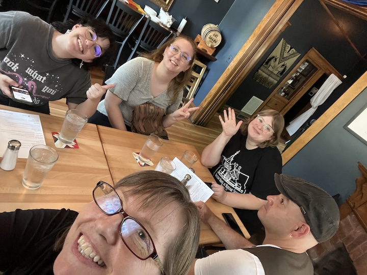 A picture of several The Square PHX staff members having lunch at Teeter House at The Square PHX.