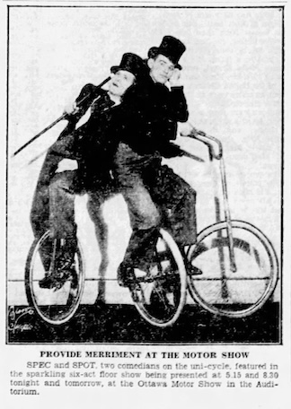 A newspaper clipping of two men on unicycles, wearing top hats and coats with tails.