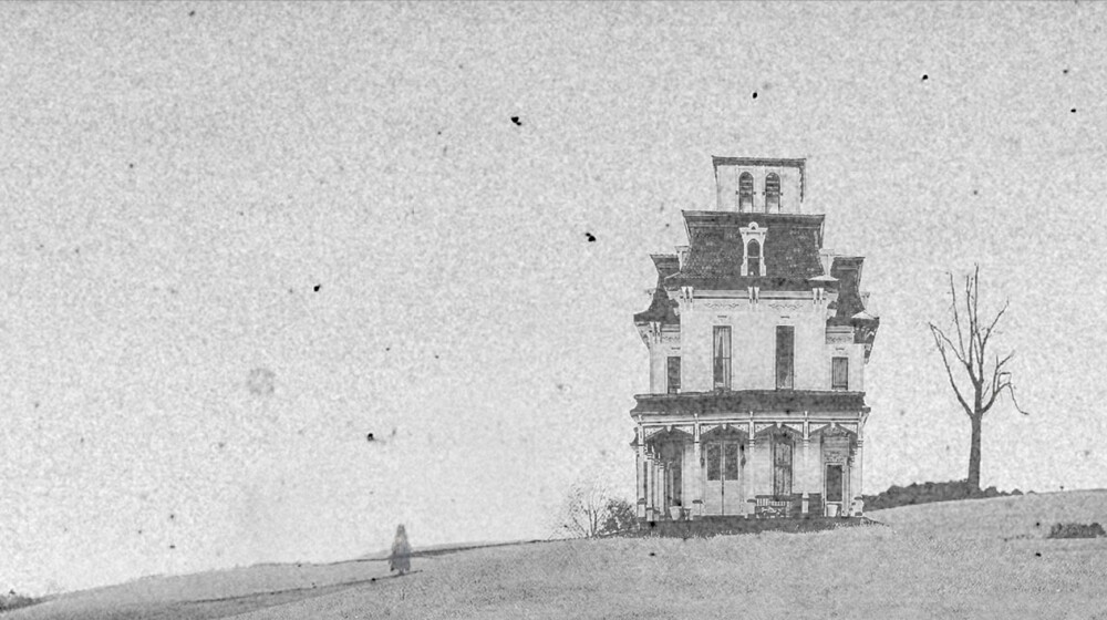 An eerie looking black and white photo edited to look old and haunted.